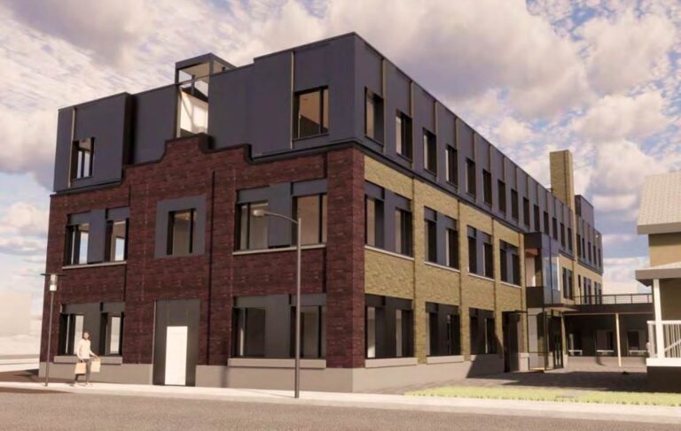 Computer generated image shows the proposed new third floor addition to the existing 97 Victoria building. The addition has dark grey cladding with large windows.