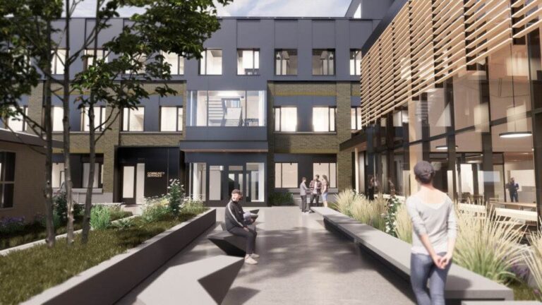 Computer generated image of proposed Making Home project. Image shows outdoor courtyard with trees, bushes, public benches, and people. 97 Victoria building is shown renovated with new windows and a new building for Saint John's Kitchen.